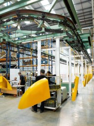 an-overhead-conveyor-system-in-jcb-heavy-products
