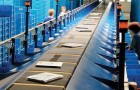 Interroll cross belt sorters – The economical solution