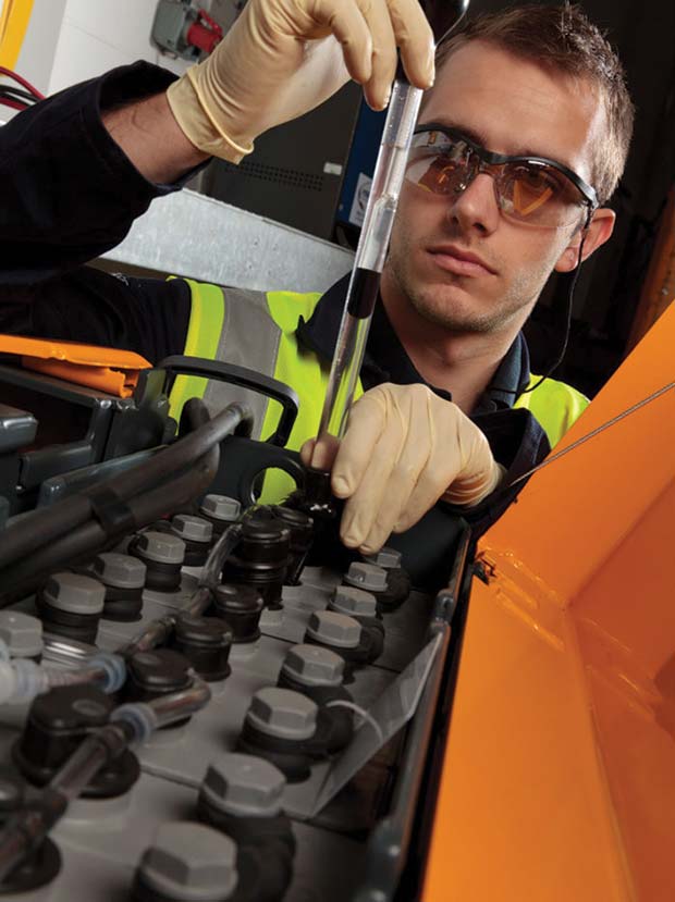 Engineer-working-on-battery